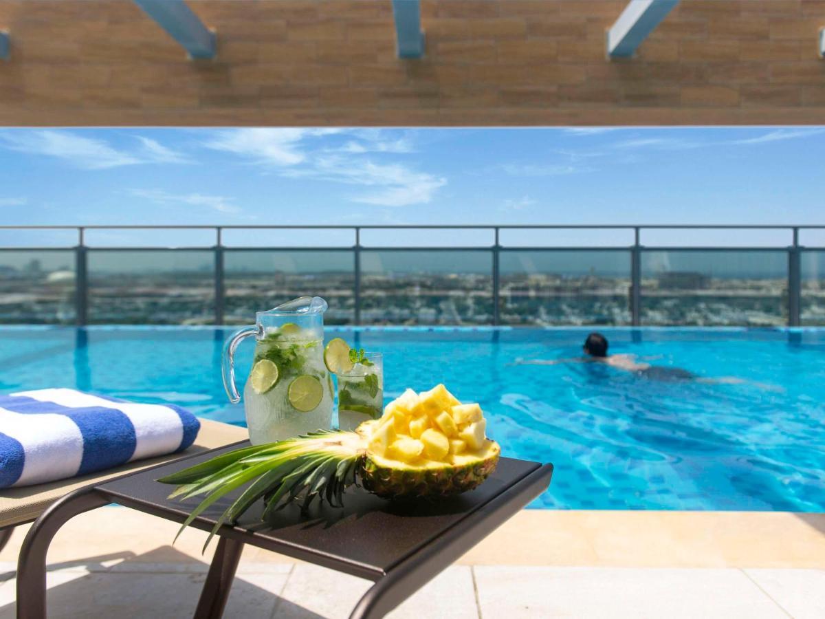 Swissotel Living Dschidda Exterior foto The swimming pool at the hotel